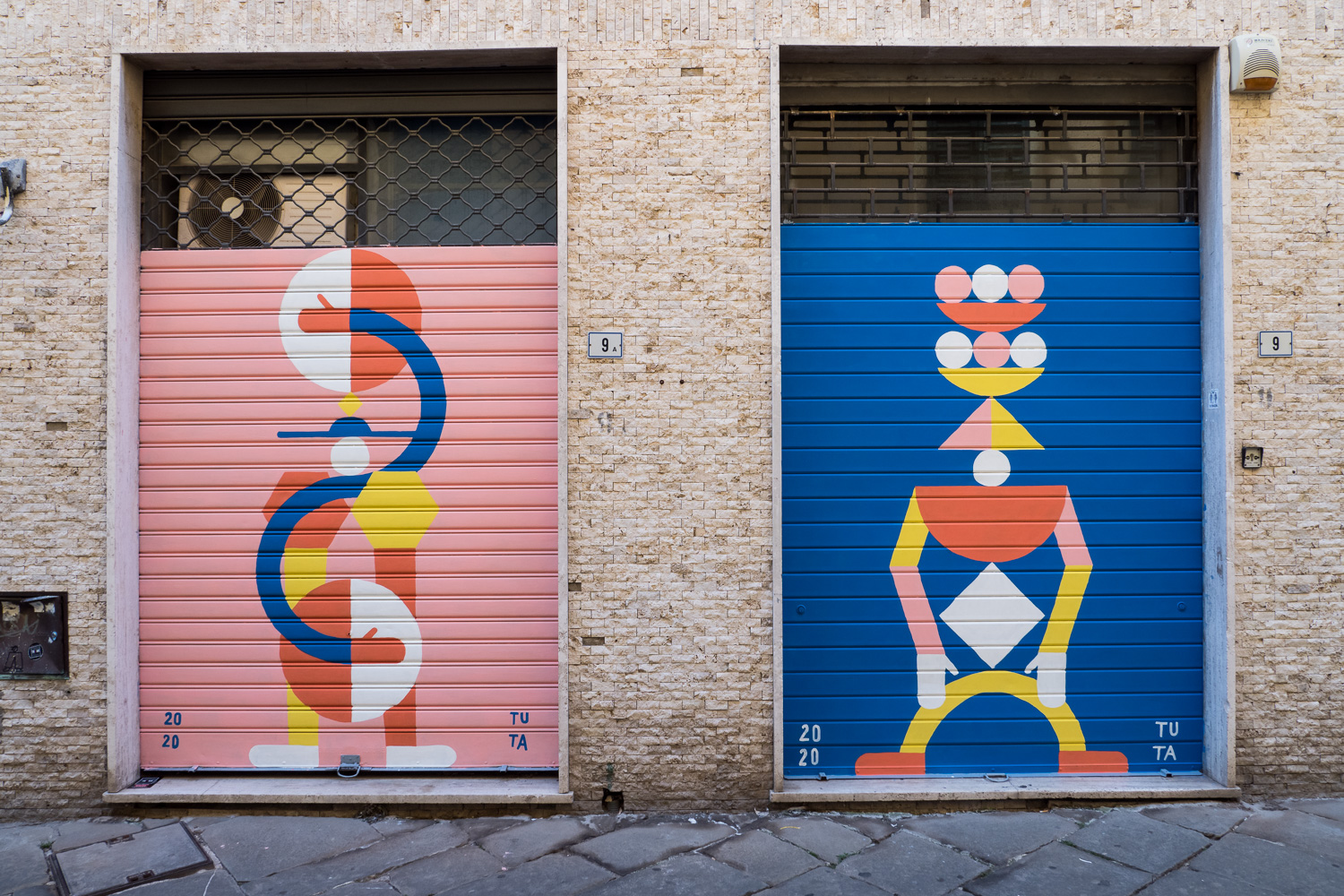 Two rolling shutters by artist duo TUTA fro
